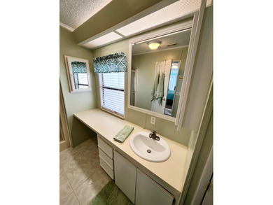 This meticulously maintained two-bedroom, two-bath home is - photo 32