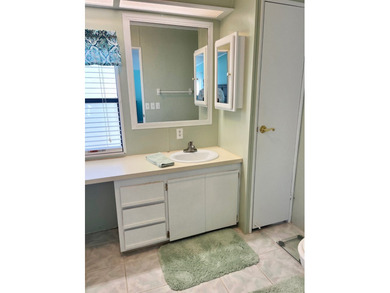 This meticulously maintained two-bedroom, two-bath home is - photo 33