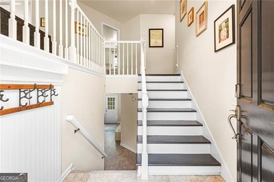 Step into this beautifully refreshed split-level home, ready and - photo 2