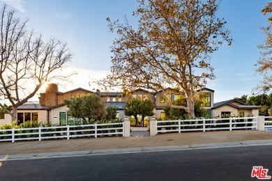 Completed in 2025, this stunning custom estate is sited in the - photo 1