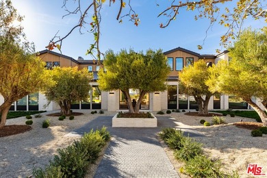 Completed in 2025, this stunning custom estate is sited in the - photo 2