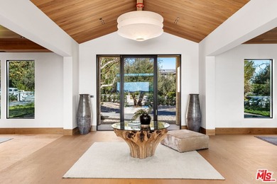 Completed in 2025, this stunning custom estate is sited in the - photo 3