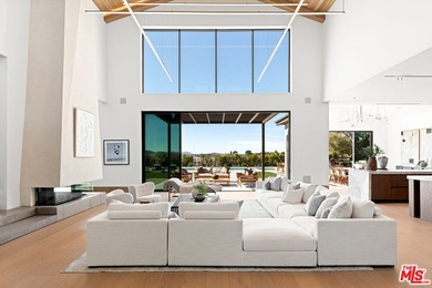 Completed in 2025, this stunning custom estate is sited in the - photo 4