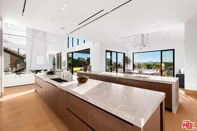 Completed in 2025, this stunning custom estate is sited in the - photo 7