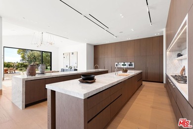 Completed in 2025, this stunning custom estate is sited in the - photo 8