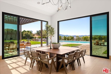 Completed in 2025, this stunning custom estate is sited in the - photo 9