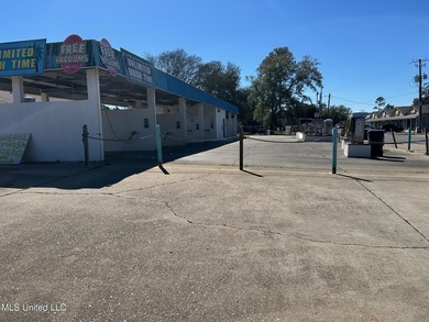 Corner lot on Pass Road in Biloxi. Former carwash location - photo 1