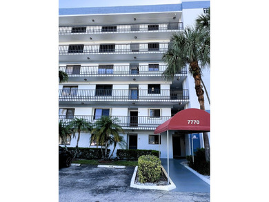 Welcome to this charming 2-bedroom, 2-bathroom condo on the - photo 1