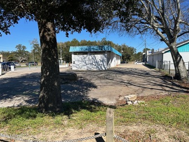 Corner lot on Pass Road in Biloxi. Former carwash location - photo 5