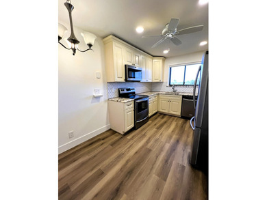 Welcome to this charming 2-bedroom, 2-bathroom condo on the - photo 6