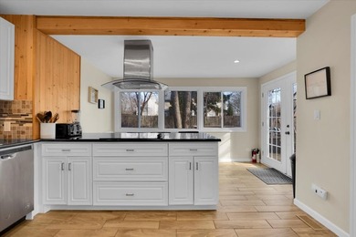 Welcome to this beautifully remodeled lake-area retreat with - photo 15