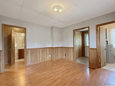 Welcome to this cozy and well-maintained 3-bedroom, 1-bath