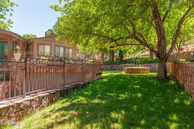 Set beneath the canopy of mature pines and just steps from the - photo 9