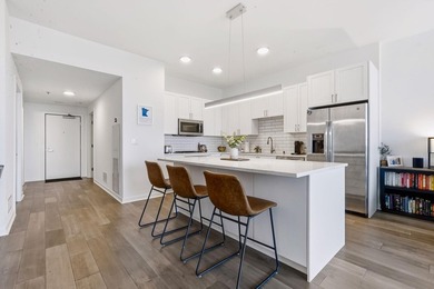 South facing unit filled with natural light, 2 garage stalls - photo 12