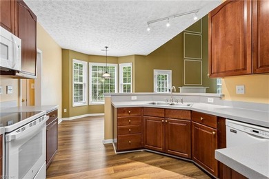 Welcome home to this beautiful two-story residence, perfectly - photo 13