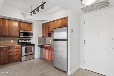 Elevated 9th floor living awaits in this updated end unit. Enjoy - photo 9