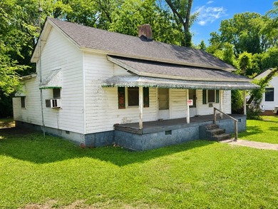 Opportunity is knocking at this 2-bedroom, 1-bath home built in - photo 2