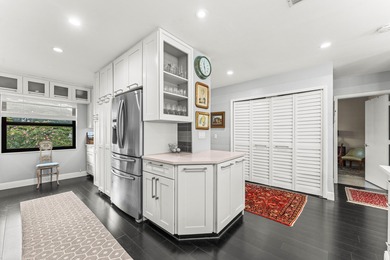 Welcome home to this exceptional, recently renovated upper-floor