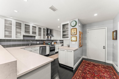 Welcome home to this exceptional, recently renovated upper-floor