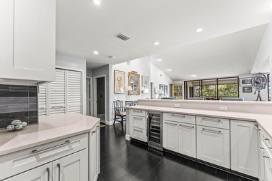 Welcome home to this exceptional, recently renovated upper-floor