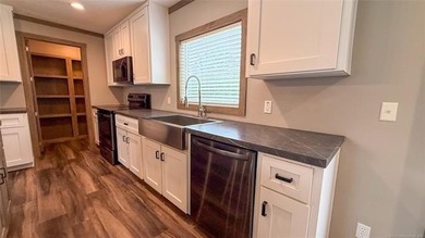 Move-in ready home with an incredible 50'x100' insulated shop on - photo 22