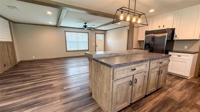 Move-in ready home with an incredible 50'x100' insulated shop on - photo 23