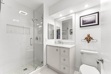 Welcome home to this exceptional, recently renovated upper-floor