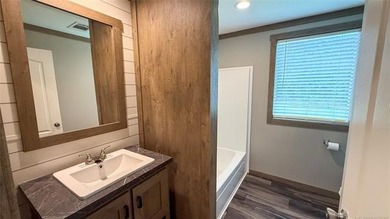 Move-in ready home with an incredible 50'x100' insulated shop on - photo 30
