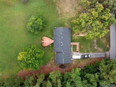 Charming newly remodeled brick home on over an acre in a