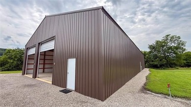 Move-in ready home with an incredible 50'x100' insulated shop on - photo 50