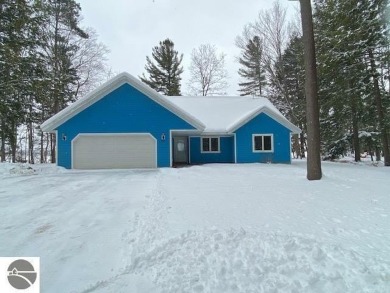 Lake Home For Sale in Grawn, Michigan