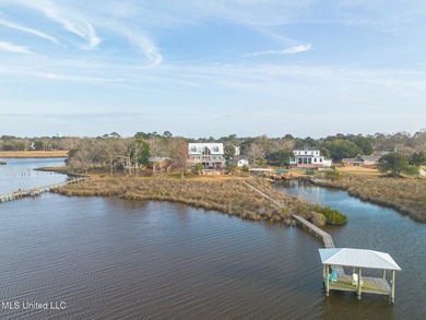Introducing a rare riverfront retreat in the sought-after - photo 2