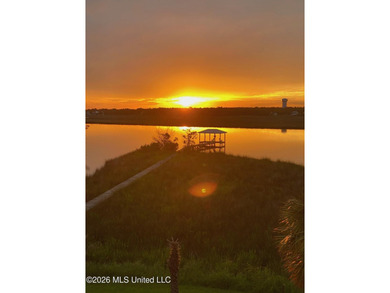 Introducing a rare riverfront retreat in the sought-after - photo 6