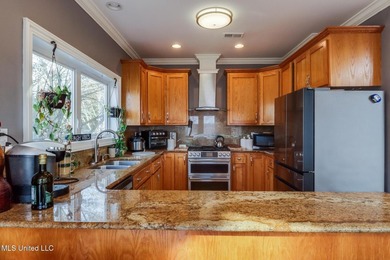 Introducing a rare riverfront retreat in the sought-after - photo 10