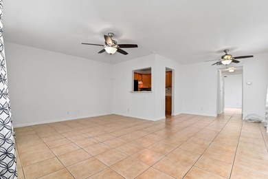 Welcome to this charming 1-bedroom, 1.5-bathroom corner-unit - photo 3