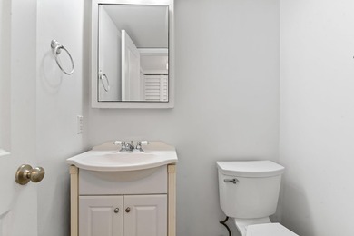 Welcome to this charming 1-bedroom, 1.5-bathroom corner-unit - photo 8