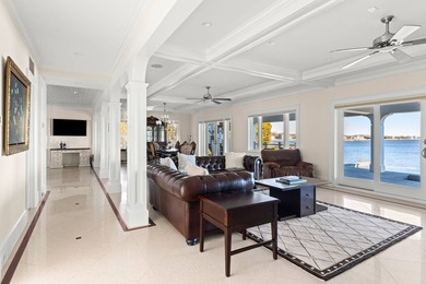 Set on 175 feet of private sandy beachfront with a 136' dock - photo 11