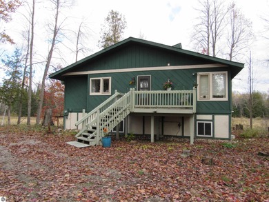 Lake Home For Sale in Whittemore, Michigan