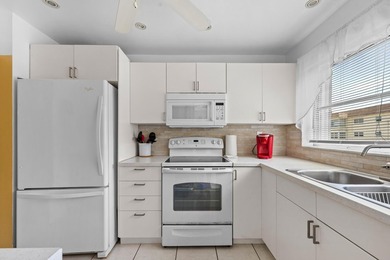 Move-in ready 2-bedroom, fully furnished residence offering a - photo 12