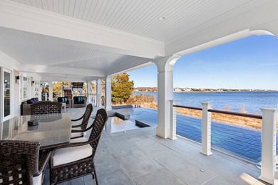 Set on 175 feet of private sandy beachfront with a 136' dock - photo 13
