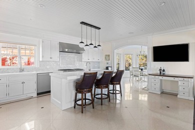 Set on 175 feet of private sandy beachfront with a 136' dock - photo 18