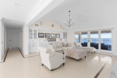 Set on 175 feet of private sandy beachfront with a 136' dock - photo 27