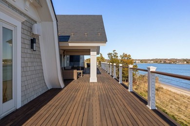 Set on 175 feet of private sandy beachfront with a 136' dock - photo 31