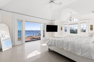 Set on 175 feet of private sandy beachfront with a 136' dock - photo 32