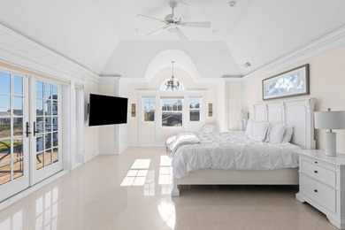 Set on 175 feet of private sandy beachfront with a 136' dock - photo 33
