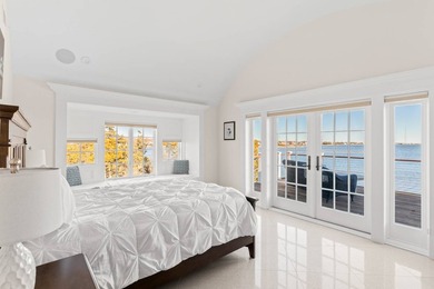 Set on 175 feet of private sandy beachfront with a 136' dock - photo 36