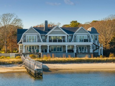 Set on 175 feet of private sandy beachfront with a 136' dock - photo 46
