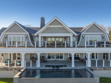 Set on 175 feet of private sandy beachfront with a 136' dock - photo 49