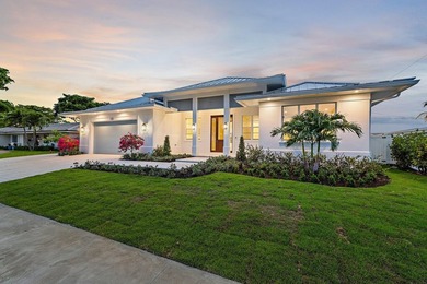 The Contemporary Coastal Village lifestyle awaits in this - photo 2
