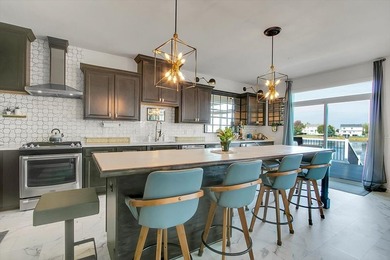 Light-filled and spacious, this open floor plan features vaulted - photo 16